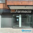 Instalación de puertas enrollables de aluminio en farmacia